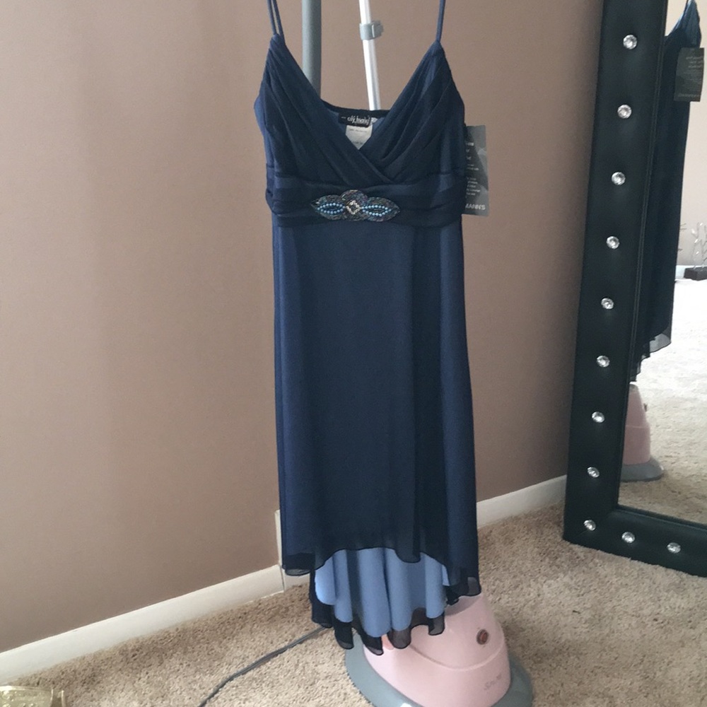 Dress with studs in front never worn, with tags
